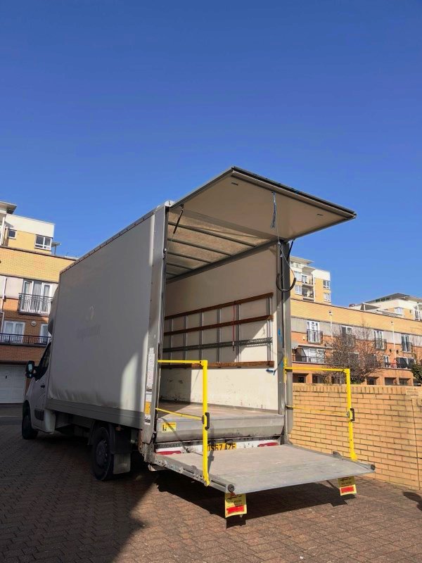 Luton van with tail lift open showing spacious cargo area